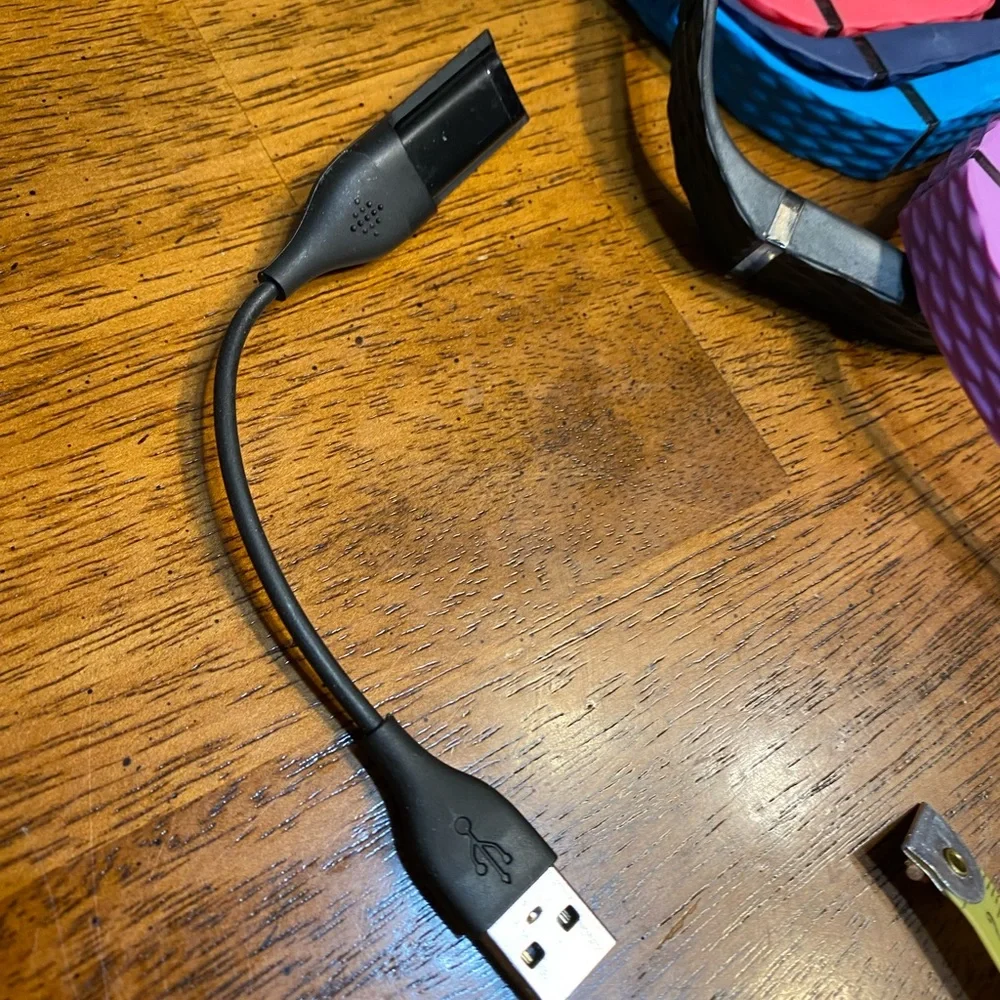 Silicone replacement bands for Fitbit. And charger.